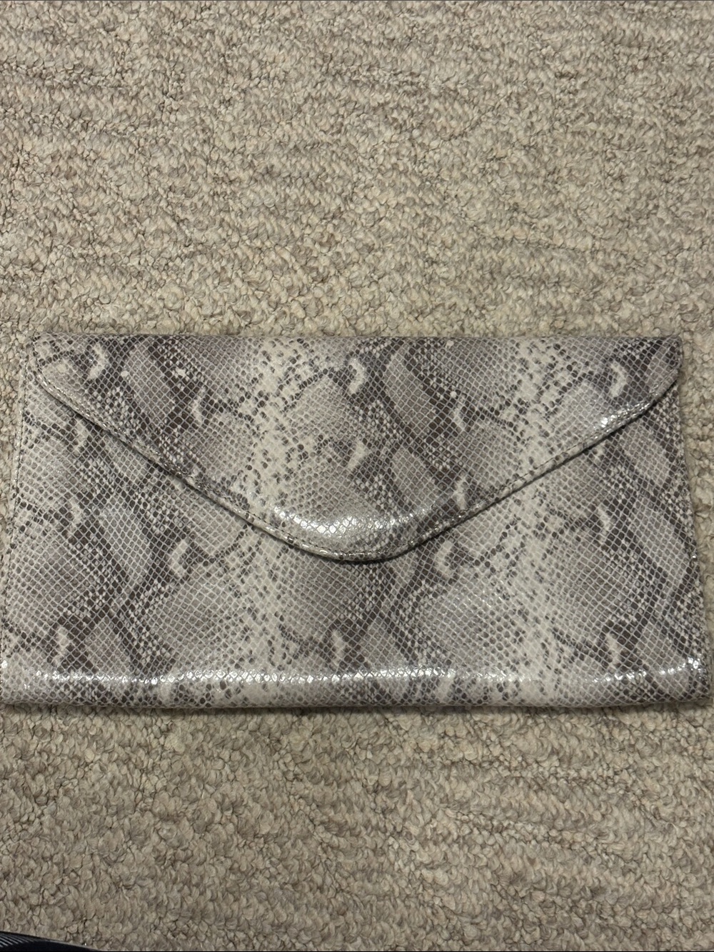 Brave Leather “Animal Instincts” snakeskin/python with signature leopard pocket